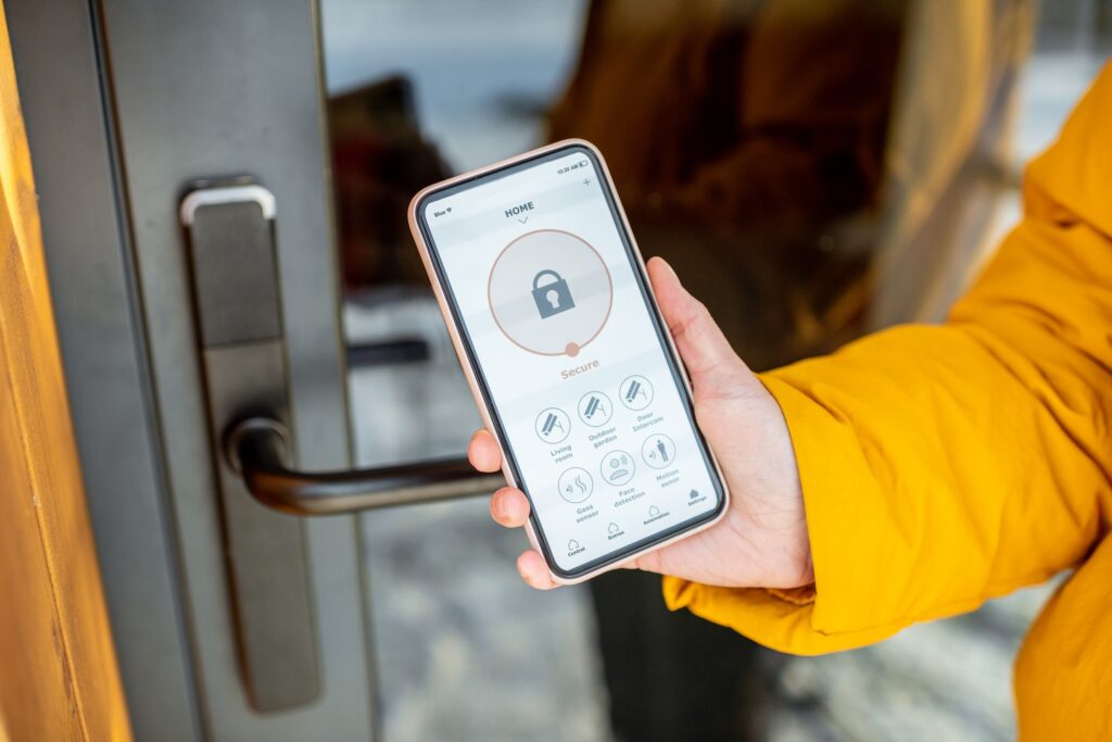 Locking entrance door with a smart phone